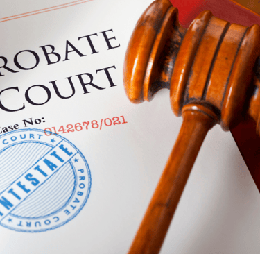 Probate court paperwork with judge’s gavel representing legal process