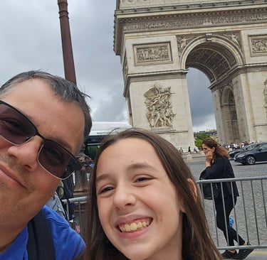 Ben and his lovely assistant at the Arc de Triomphe, Paris.