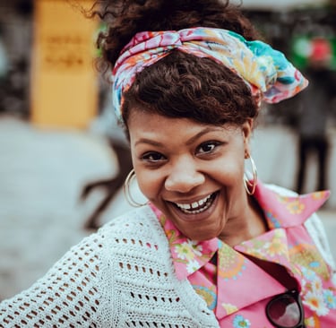 A happy mom that is testifying about Chimhanda Tutoring's Cambridge Maths Online Tutoring