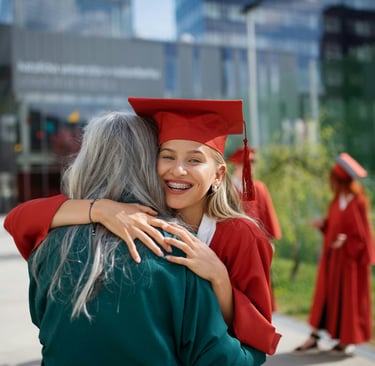 A happy students and a parent that are graduating because they used chimhanda tutoring's cambridge maths online tutoring