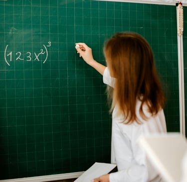 A Level Maths Online Tutor with an A Level Maths students solving questions