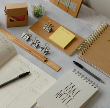 An image with stationary on a desk used to show the benefits of a study system