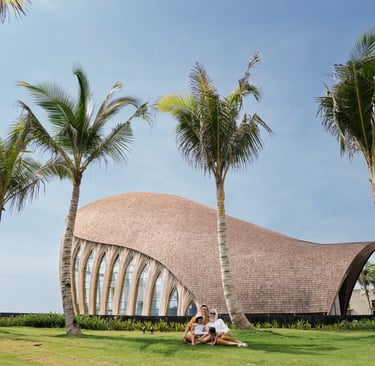 Family portrait during a family photography session at  Front of Chapel The Apurva Kempinski Nusa dua Bali.
