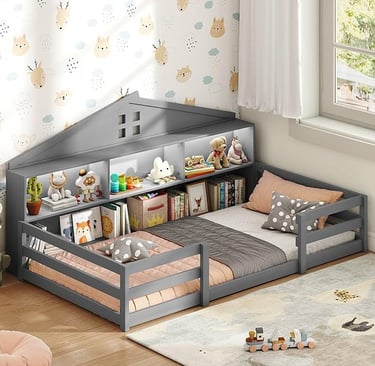 Gray wooden house-shaped floor bed for kids featuring built-in bookshelves and storage headboard.