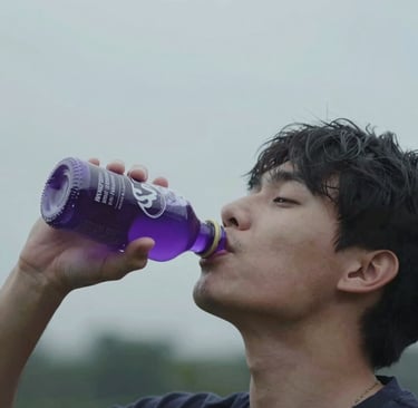 a man with a gun in his hand standing in smoke