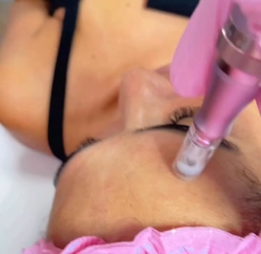 a woman is getting her eyebrows done by a professional hairdrewhich