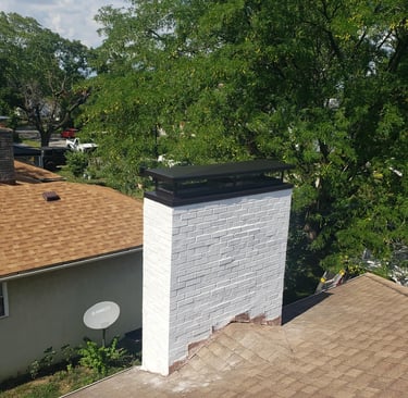 Residential chimney maintenance service in Waltham, MA by NE Chimney experts.