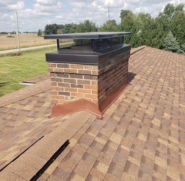 Brick chimney masonry project in Waltham, MA performed by NE Chimney professionals.
