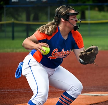 SOFTBALL PITCHER TURNING TO THROW TO FIRST