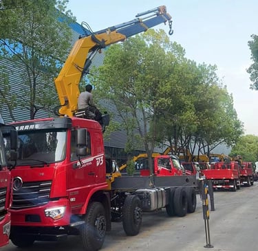 Image of a crane truck with a 16 Ton Knuckle Lorry Loader Crane on white background.