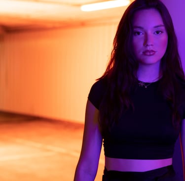 girl in neon light fitness studio