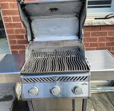 Grill lid and burner area restored to like-new condition after cleaning