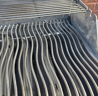 Spotless BBQ grill showing gleaming results after expert cleaning