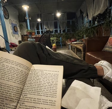 Me again. Reading on the peaceful terrace of the hostel where I stayed.