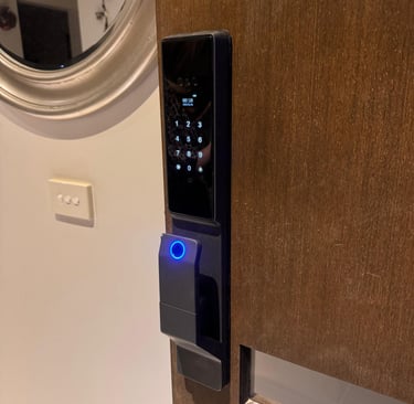 IPM016 smart lock installed on timber door in Wantirna South showing touchscreen keypad and Face ID