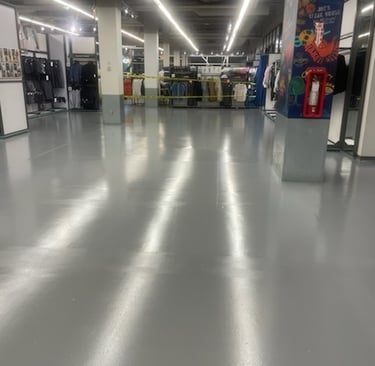 A retail store with a polished concrete floor. 