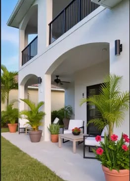 Modern concrete patio with seating area in Apopka home—built for Florida heat and rain