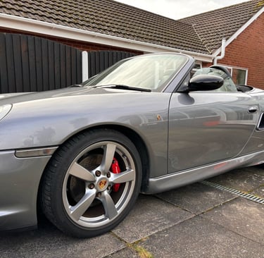 shiny silver Porsche