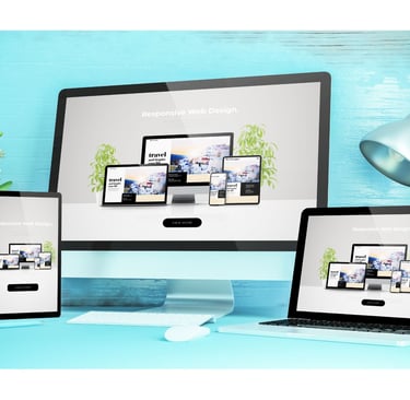 a desktop computer monitor and a laptop computer