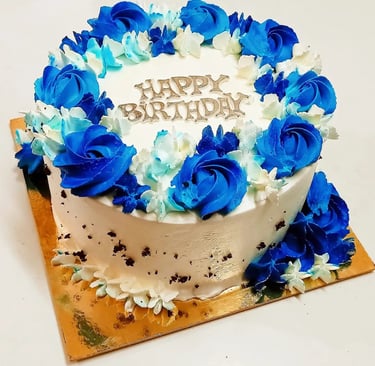 Delicious chocolate truffle cake topped with rich chocolate ganache, garnished with chocolate shavin