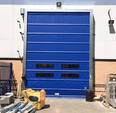900gsm speed door in blue PVC with clear window view sections