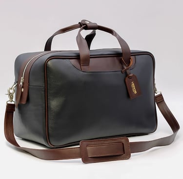 a black and brown briefcase with a brown leather bag
