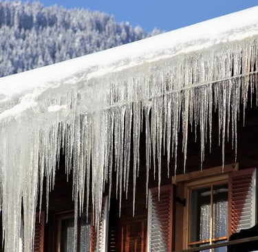 “Icicles on roof — exterior home check for winter storm damage
