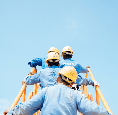 workers with blue uniforms