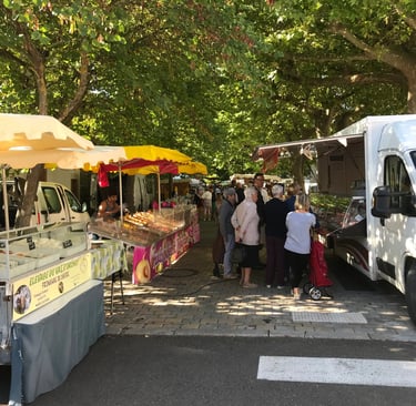 Market day in Quillan with local produce and stalls