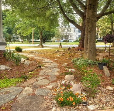 stone walkway and flowers and front porch 2123 rivermont