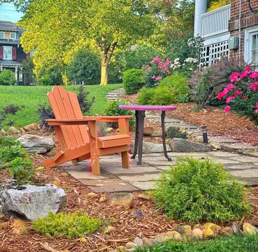 a wooden chair with a table and chairs
