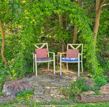 garden arch of wisteria and stove floor