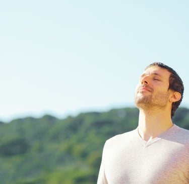 a man with a beard and a white shirt