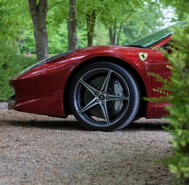 Front of a Ferrari from behind a hedge at Goodwood Breakfast Club Supercar Sunday 2017