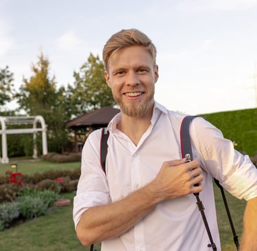 a man photographer with big smile