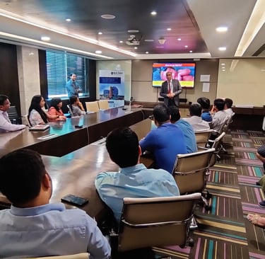 Dr. Prabal conducting corporate leadership training in a boardroom