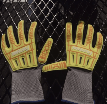 The grotesque gloves contain an ominous message