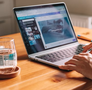 Virtual assistant working remotely on a laptop