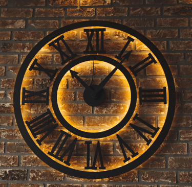 Old clock on a brick wall