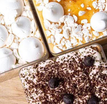 a variety of desserts in a variety of containers