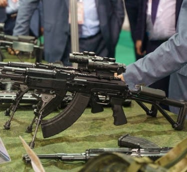 automatic weapons displayed at Texas gun show