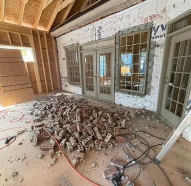 demolition-services-on-a-brick-wall