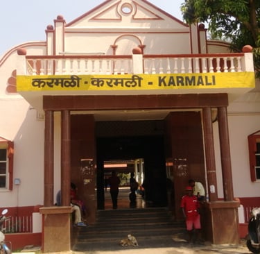 a building with a sign that says, Karmali Railway Station