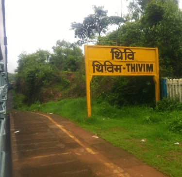 a sign board that says Thivim