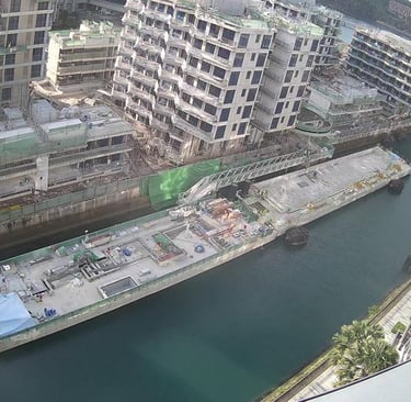 a large building with a large body of water
