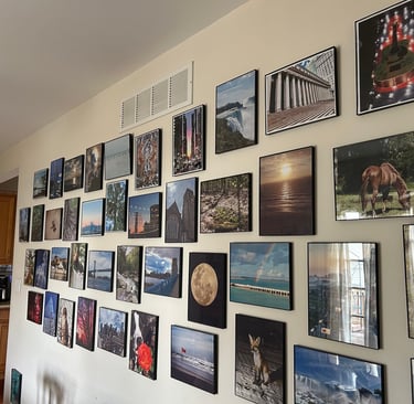 a wall of picture wall art and kitchen wall art
