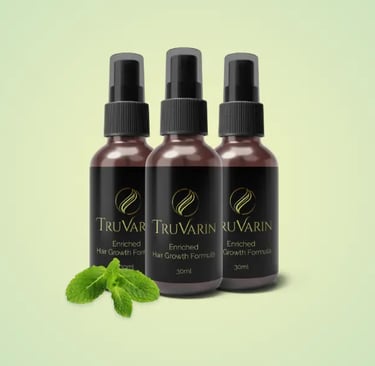 Three bottles of Truvarin Enriched Hair Growth Formula, 30ml each, displayed with mint leaves in front.