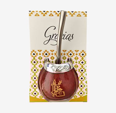 Traditional Gourd mate gourd with silver rim and bombilla straw for yerba mate tea.