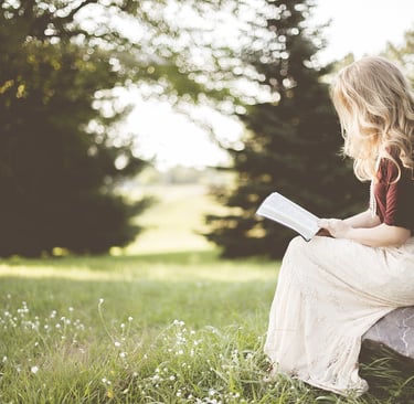 Free stock photo from pixabay.com of a woman reading in a place far warmer than my home was!!