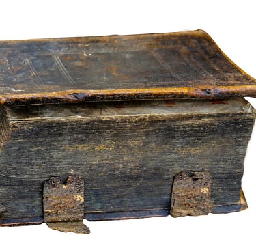 A very very old and ominous looking tome of forbidden knowledge.